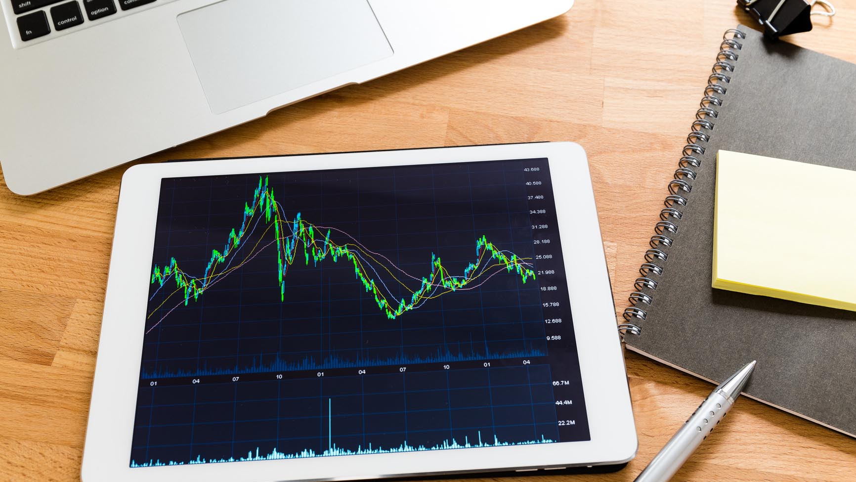 Business Analytics on a wooden Desk